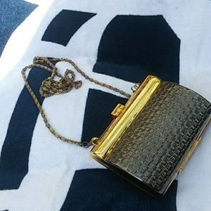 Alpha and Omega metal purse